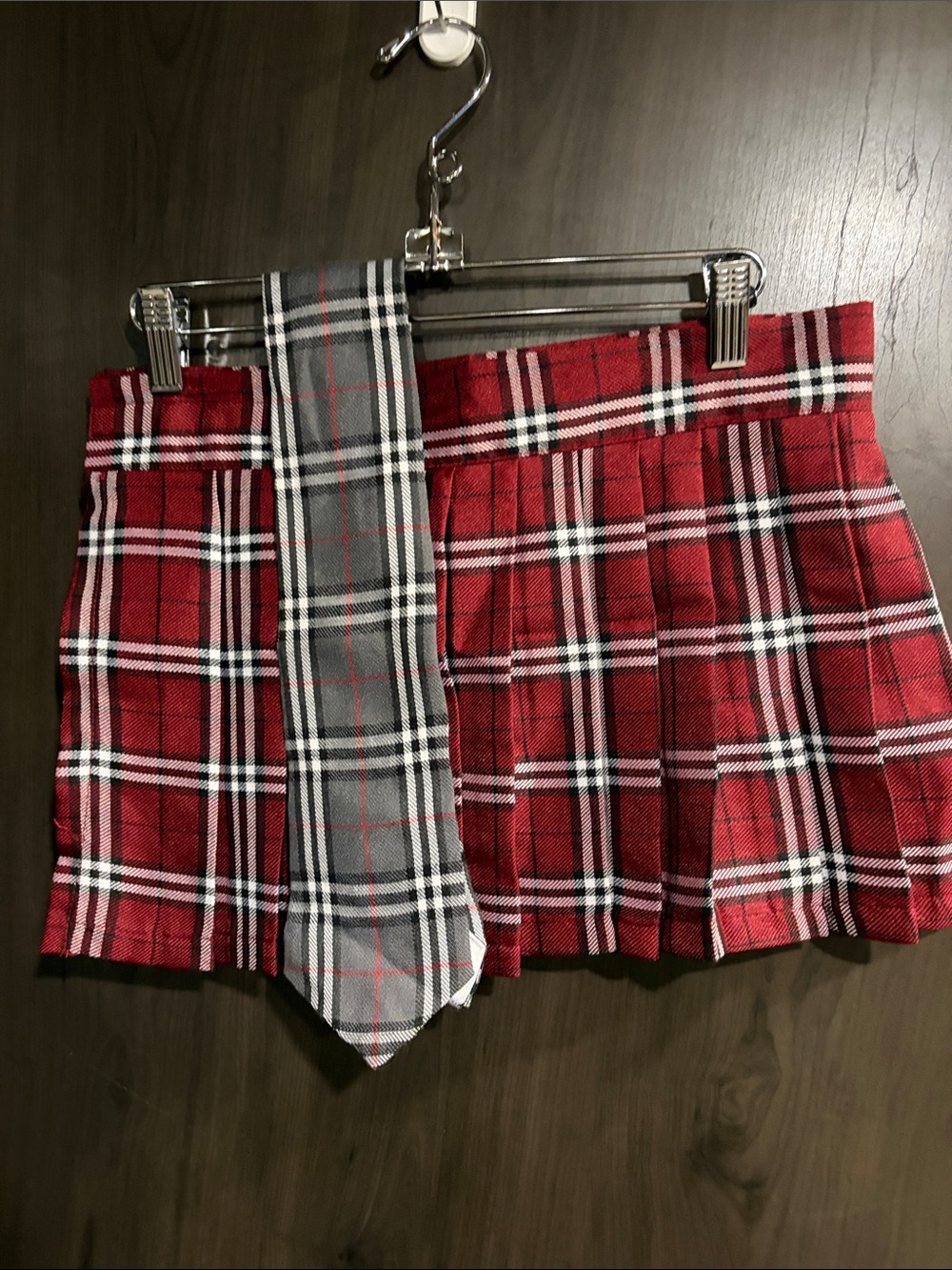 Spirit Halloween school girl skirt and tie.